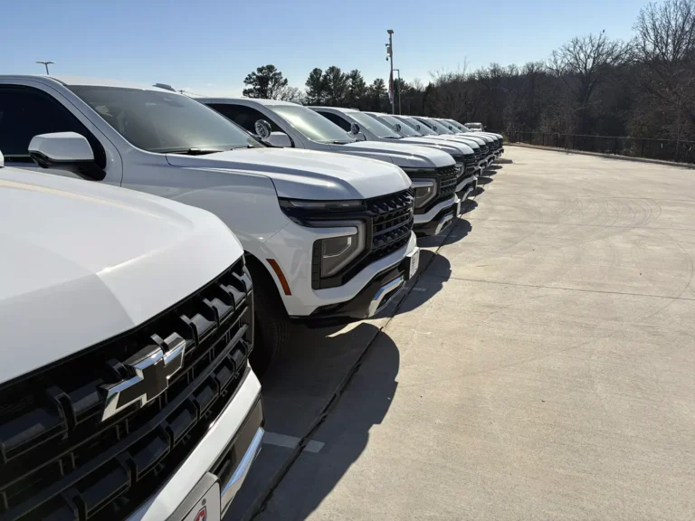 Row of white Chevrolet Tahoe vehicles available for upfitting for law enforcement and first responders